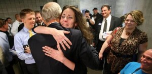 Ron Paul gets a hug from an emotional Britni Agnew, after speaking at the UCCU Center in Orem on Thursday, Oct. 18, 2012. (Kristin Murphy, Deseret News)